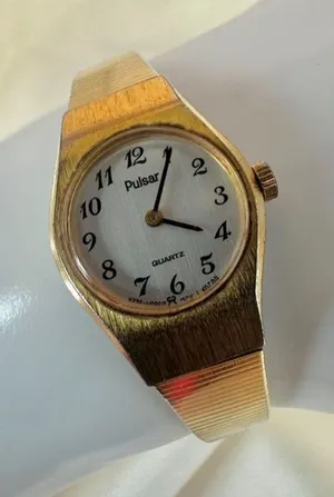 Pulsar gold tone stainless steel vintage watch thumbnail 1