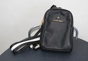 Nanette Lepore Black Pebbled Sling Crossbody Bag Striped Adjustable Strap thumbnail 1