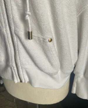 JUICY COUTURE-WHITE ZIP FRONT HOODIE-WOMENS SIZE SMALL Cozy white hooded zip-up jacket with drawstrings. Perfect for casual wear, 3/4 sleeves, gold hardware, J zipper pull, 100% cotton, has stretch, excellent condition Measurements: Bust: armpit to armpit 23-25 inches Length: shoulder seam to bottom 20 inches thumbnail 6