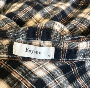 Black and cream plaid button-up flannel shirt thumbnail 4