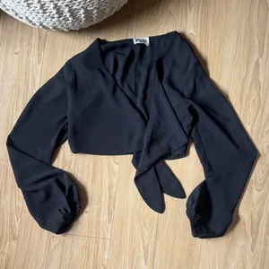 Show Me Your MuMu Black Wrap Blouse thumbnail 1