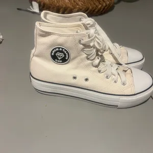 Frock Candy Women’s high-top sneakers in a clean white/cream color thumbnail 3