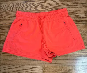 Athleta Neon Coral Athletic Shorts thumbnail 1