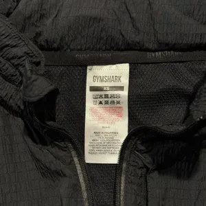 Gymshark Womens Jacket Speed Windbreaker Vented Packable Hood Black Size XS FK thumbnail 4