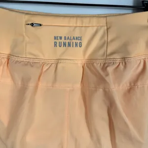 New Balance Running Shorts XS‎ Peach Lightweight Athletic Activewear Women thumbnail 8