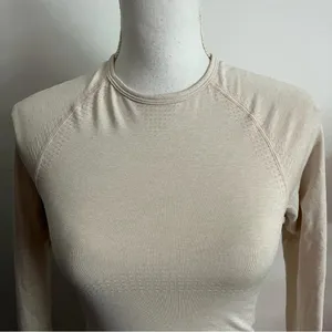Gymshark • Cream Cropped Long Sleeve Workout Top thumbnail 3