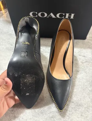 Coach black leather pointed toe pumps with gold studs along the edge, size US 6.5 thumbnail 4