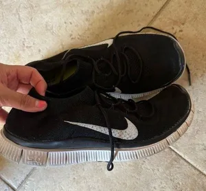 Black Nike running shoes thumbnail 1
