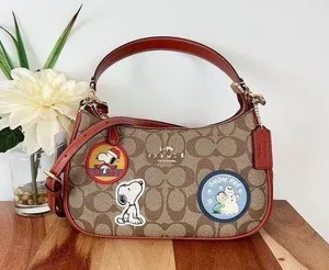 NWT Coach X Peanuts Teri Shoulder Bag In Signature Canvas With Patches thumbnail 1