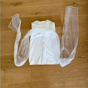 Lulu's - Flawless Entrance Pearl Organza Bow Strapless Mini Dress in White thumbnail 5
