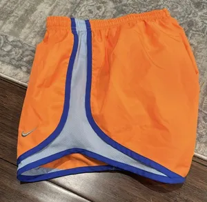 Nike DriFIT Athletic Orange Dash Running Shorts thumbnail 1