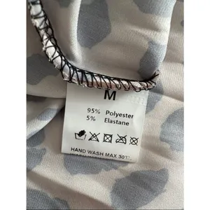 Leopard Print A-Line Midi Skirt in Beige and Black EUC thumbnail 4
