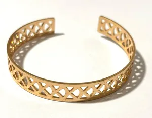 Gold tone bangle bracelet thumbnail 1