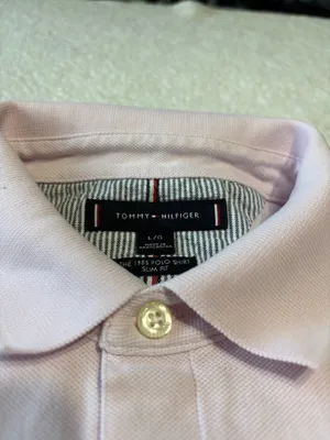 Classic short-sleeve polo shirt with signature embroidered chest flag logo, multi-button placket, and tailored silhouette. thumbnail 3