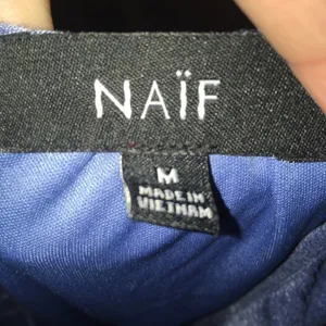 Naïf embroidered tie neck flowy boho blue tunic thumbnail 3