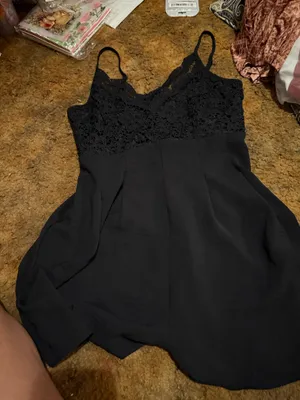 SheIn Chic mini dress with lace bodice and delicate straps. Flowy skirt with soft drape. Versatile black piece for day or night. Lightweight and feminine look. thumbnail 1