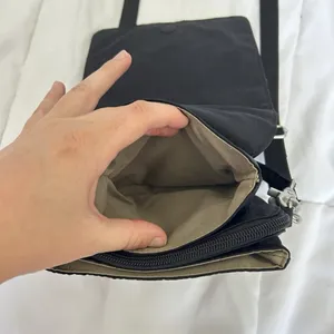 BAGGALLINI Black Water-Resistant‎ Nylon Lightweight Pocket Town Crossbody Bag thumbnail 7