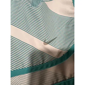 Nike Dri-FIT Running Shorts Women’s Medium Aqua White Geometric Athletic thumbnail 3