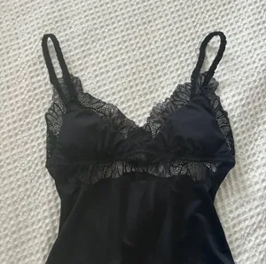 NWOT Abercrombie and Fitch black lace trim open back satin body suit thumbnail 6