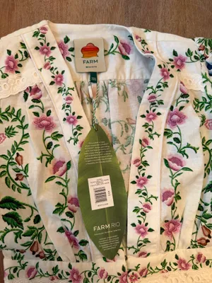 The Farm Rio Folk Floral Jumpsuit features a vibrant print with short sleeves, a V-neckline, and a relaxed, wide-leg silhouette. thumbnail 4