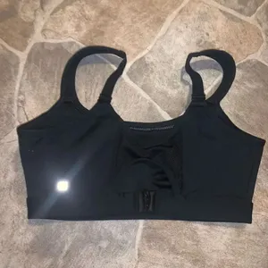Fabletics L Athleisure black cutaway high impact sports bra thumbnail 2