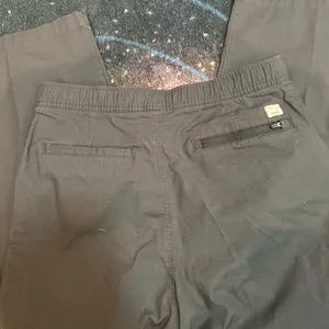 Vuori Women's Boot Cut Pants in Dark Brown thumbnail 1