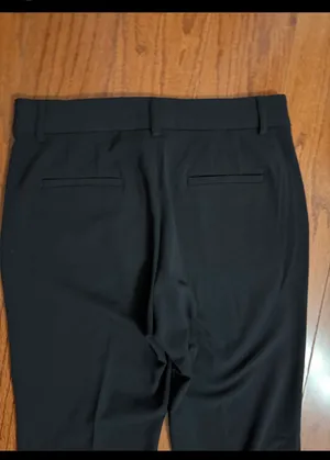 Nine West Black High waste/ wide leg pants - Size 8. Great pair of pants. Pockets on front & back. Gently warn & excellent condition. Mark on top is the iron over pockets, will wash out. Measurements approximately 16” waste x 11” rise x 39”. priced to sell at as is condition. None smoking home. Don’t like my price, make reasonable offer! thumbnail 4