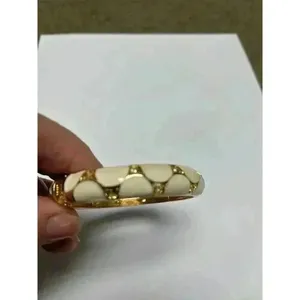 White enamel bracelet with gold/rhinestone accents‎ thumbnail 4