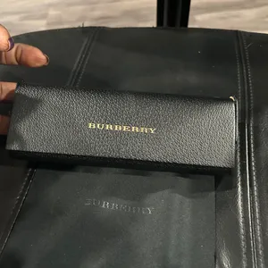 Burberry Black Case with Gold Logo includes Burberry cleaning cloth. thumbnail 8