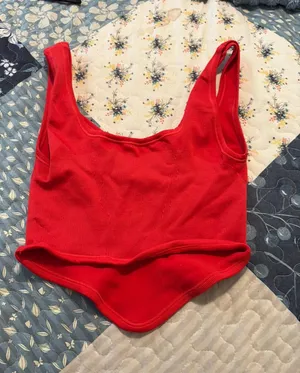 Out from under red tank top  thumbnail 1