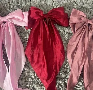 Elegant Pink and Red Hair Bows thumbnail 1