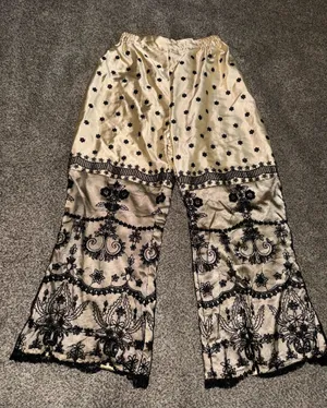 Women's Cream and Black Floral Embroidered Lace Overlay Wide Leg Satin Trousers thumbnail 1