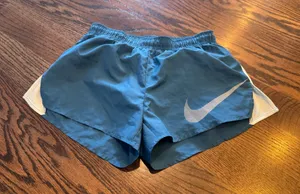 Nike Women's Drifit Athletic Shorts in Blue and White lined thumbnail 1