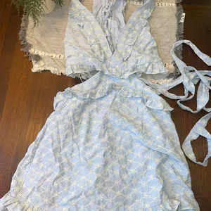 Woman’s size medium Mabel v neck dress thumbnail 1