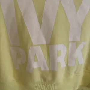 Ivy Park Cropped Oversized Hoodie Sweatshirt Sz S Pale Yellow Logo thumbnail 2