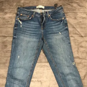 Zara blue skinny destroyed jeans thumbnail 1