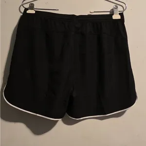 Nike Women's Black Athletic Mesh Shorts with White Trim thumbnail 2