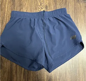 New Balance Women's Accelerate 2.5" Running‎ Shorts - Navy Blue - XS thumbnail 1