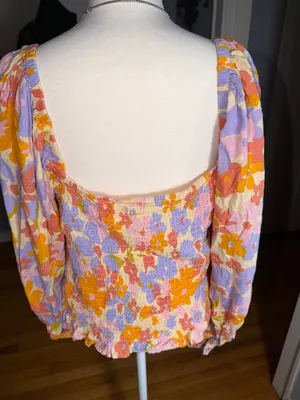 Free People 100% Cotton Floral Smocked Puff-Sleeve Top in Lavender & Orange thumbnail 9