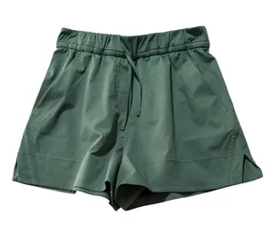 Lululemon size XS Women’s Athletic Drawstring Shorts in Dark Green cinchable thumbnail 1