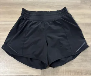 Lululemon Hotty Hot Short High-Rise Long 4" Women Size 4 Black thumbnail 1