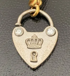 Retired RARE 2-tone “LOVE ME” Lock Collectible Bracelet Charm thumbnail 3