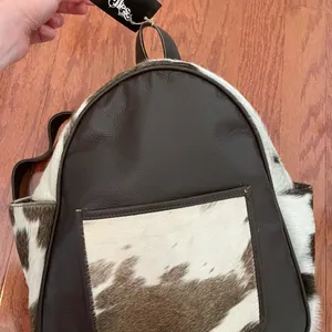 Talula Belles Pebbled Leather and Cowhide Backpack Brings Western Vibes thumbnail 1