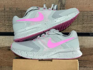 Women’s Nike pink and gray thumbnail 1