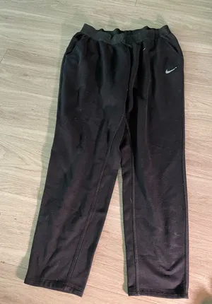 Nike Black Women’s Athletic pants with White Swoosh thumbnail 1