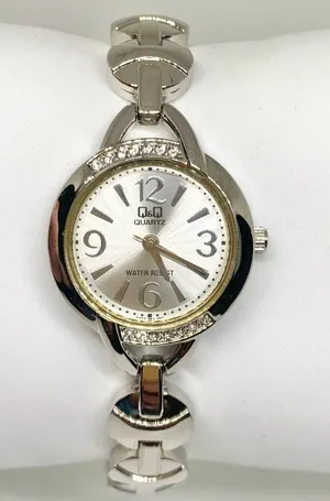 Q&Q SilverTone women’s watch 26mm quartz analog rhinestones up to 7.5” running thumbnail 1
