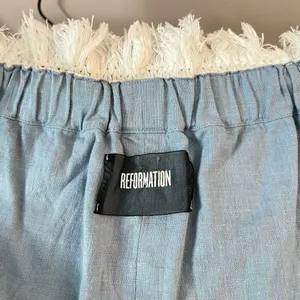 Reformation button down mini denim dress with white fringed off the shoulder nec thumbnail 8