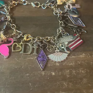 Gold tone loaded charm bracelet thumbnail 4