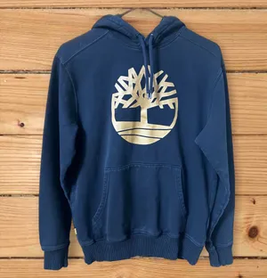 Woman’s Black And Gold Timberland Hoodie Size Small thumbnail 1