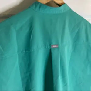 Figs Technical collection Women's Scrub Top with Pockets Size Small surgical green thumbnail 6
